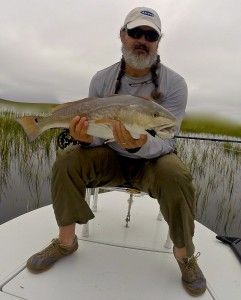 Dave With a nice red taken in the grass